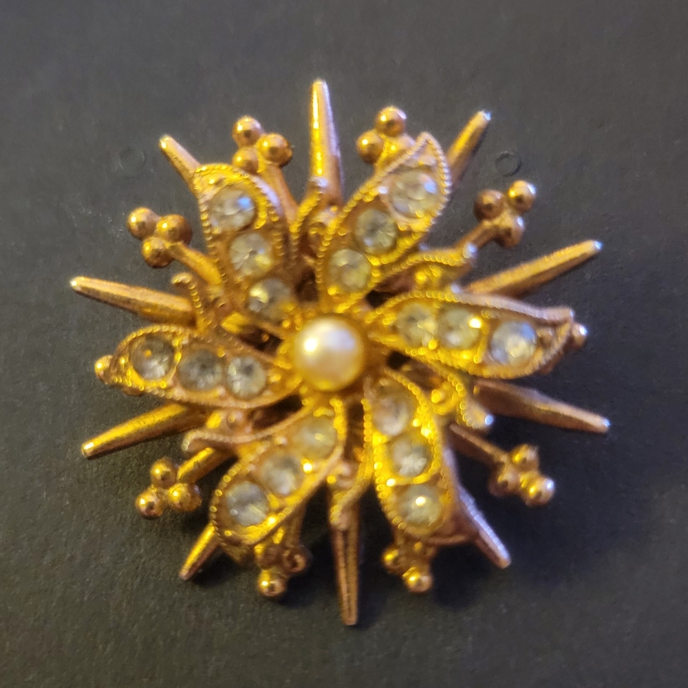 Elegant Gold and Silver Floral Brooch